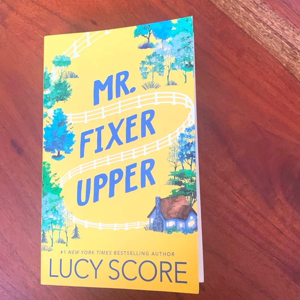 Paperback Romance novel “ Mr Fixer Upper” by Lucy Score